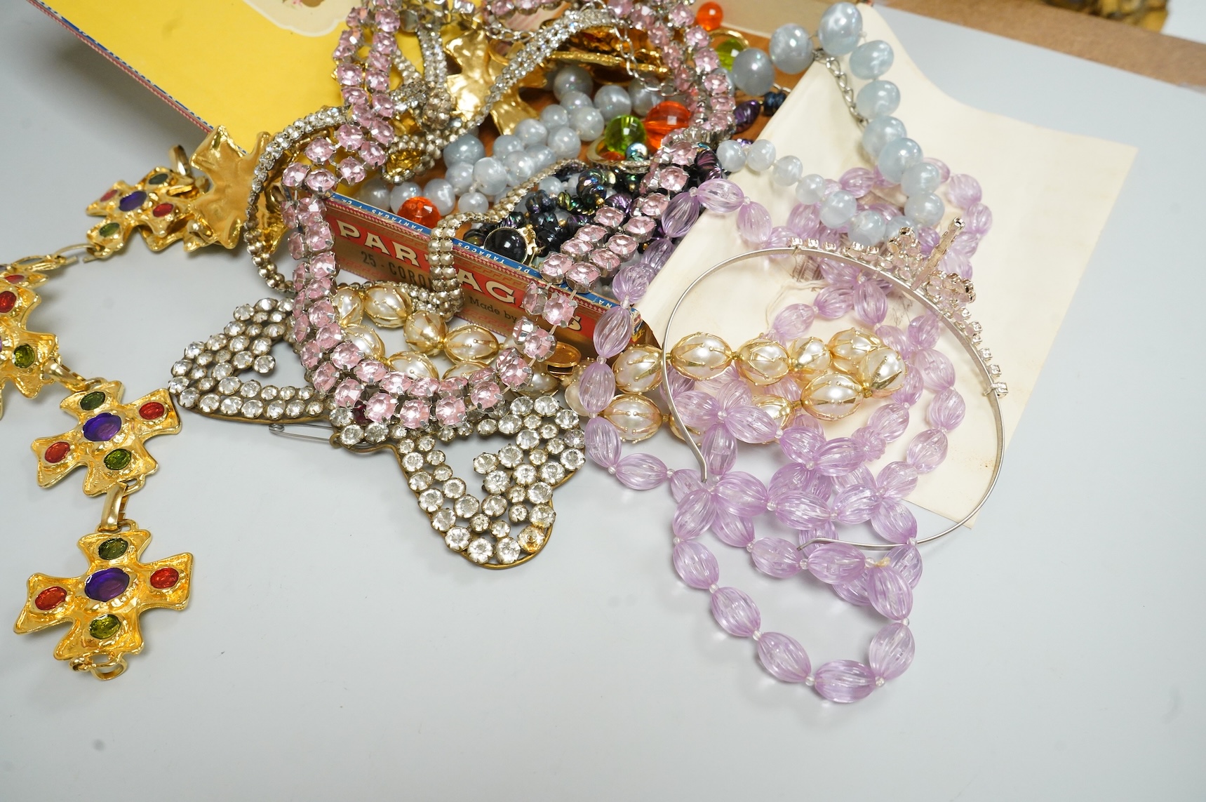 A group of assorted costume jewellery, glass beads etc.